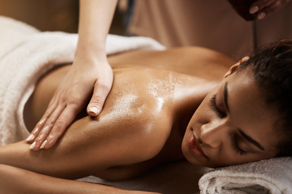 Relaxed woman enjoying a luxurious body polishing treatment at the best body polishing clinic in RBI Layout.